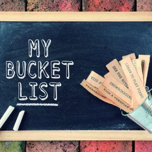 Motivational and inspirational concept - My Bucket List written on a blackboard.
